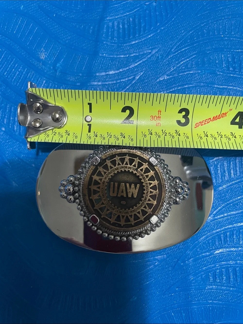 UAW silver tone belt buckle